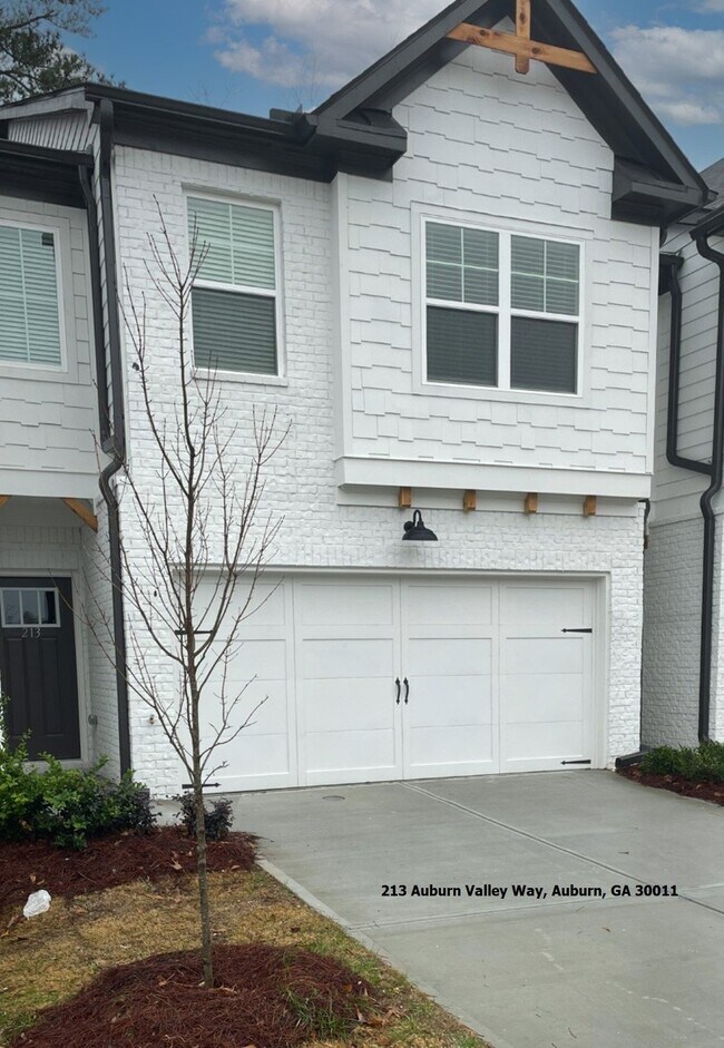 Primary Photo - Stylish 3BR Townhome with Private Yard & T...