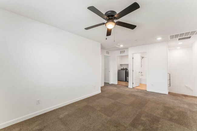 Building Photo - Modern Gated Townhome Living with Resort-Style Community Amenities