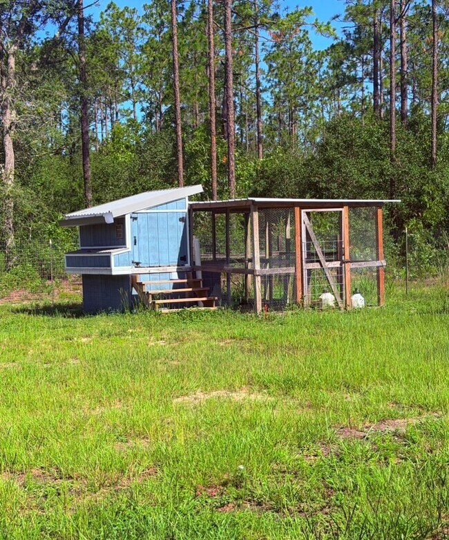 Building Photo - Gated 10-Acre Luxury Retreat with 40x60 Shop & Barn!