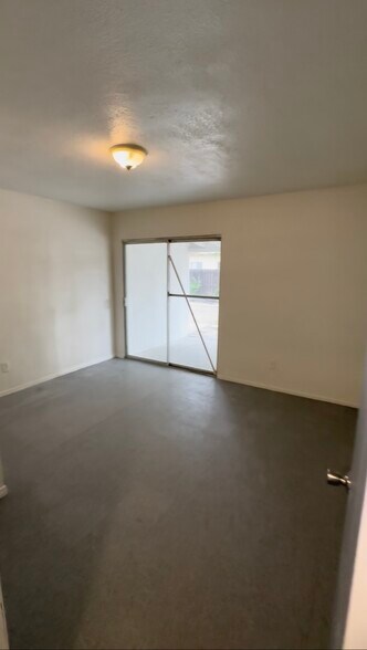 2nd bedroom w backyard access - 440 S Mistletoe Ave