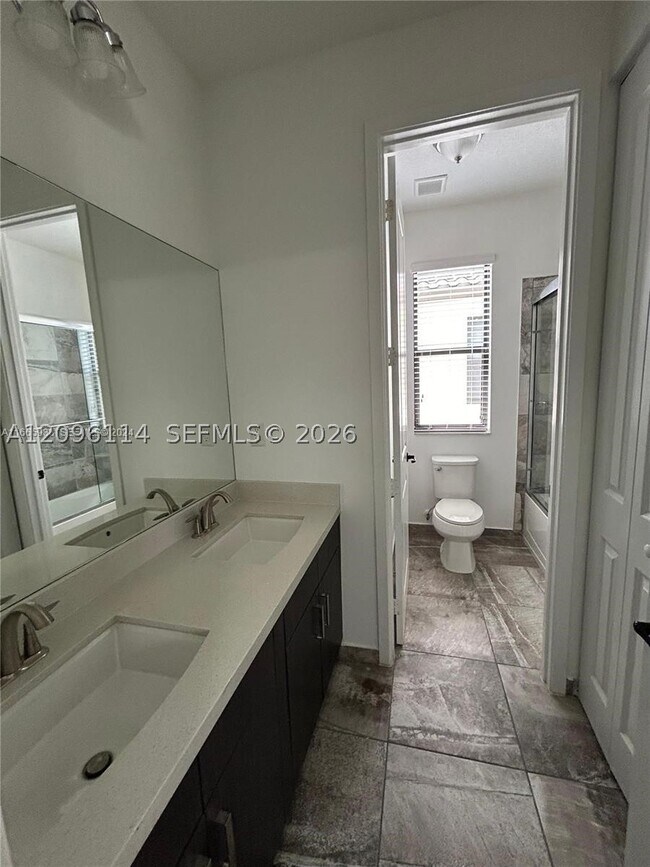 Building Photo - 9883 W 34th Ln