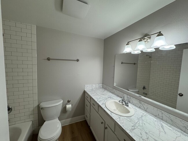 Building Photo - Fully renovated 2 bedroom, 1.5 bath apartment available with Separate Garage!  Updated Kitchen wi...