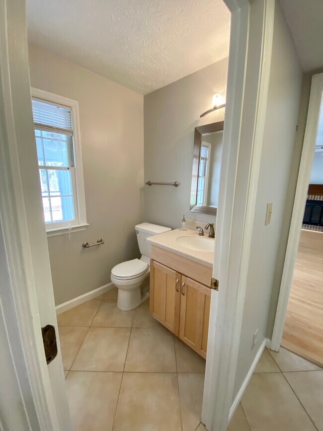 Half bathroom on the main floor - 2160 Heritage Trace Ln