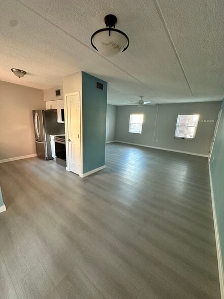 Open floor plane dining room living room vie. - 1153 Rue des Rois