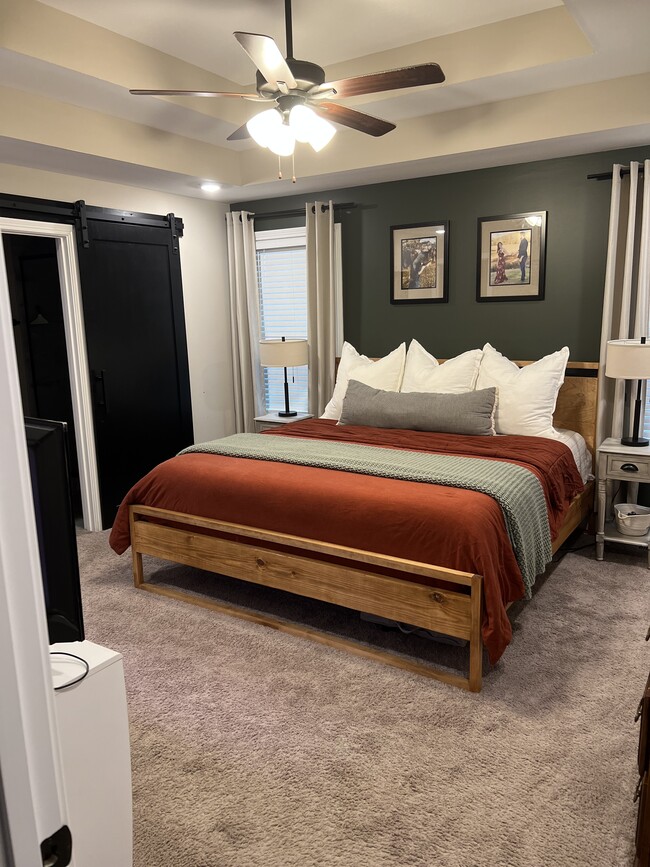 barn door access to master bathroom to maintain space efficiency - 2053 Jackie Lorraine Dr