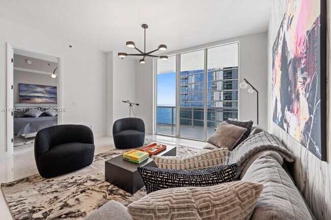 Building Photo - 15811 Collins Ave