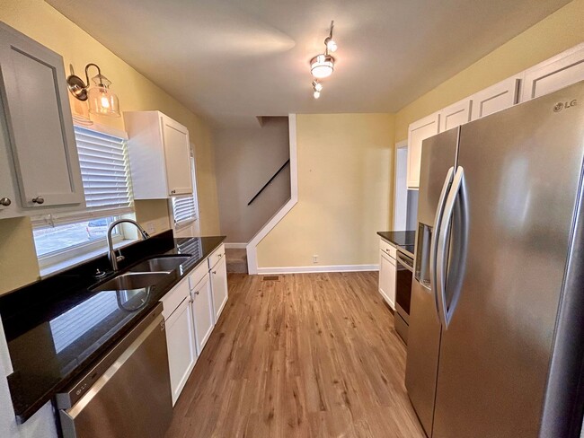 Building Photo - DELHI TWP- Spacious 4 bedroom 3 bath Cape Cod with garage