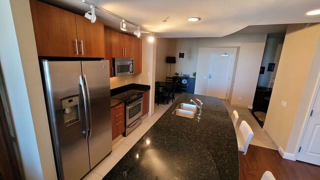Building Photo - ***GORGEOUS FURNISHED 1 BEDROOM CONDO AT A...