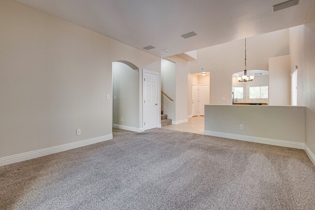 Building Photo - Spacious 3-Bedroom Home Featuring Downstai...