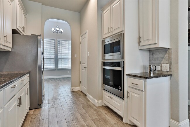 Built-in wall oven and microwave. New refrigerator - 253 Gill Point Ln