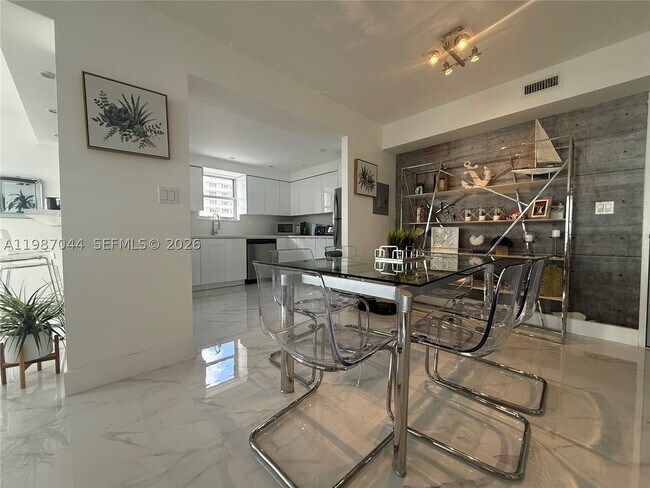 Building Photo - 5555 Collins Ave
