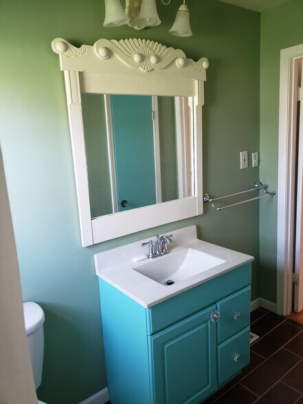Extra-large vintage mirror and new light fixture. - 10106 Wingfield Rd