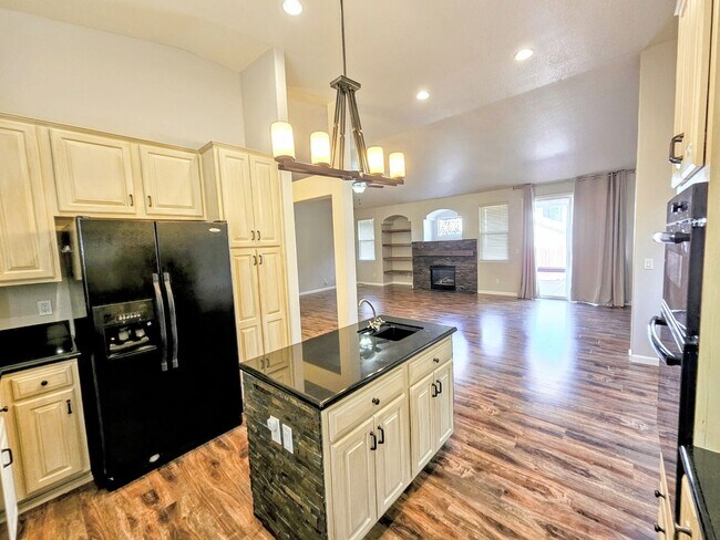 Building Photo - 3 car garage house near Mayberry Park and the Truckee River