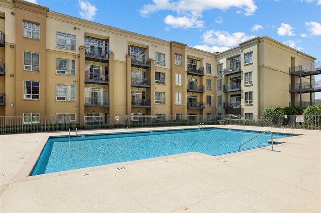 Building Photo - 711 Cosmopolitan Dr NE