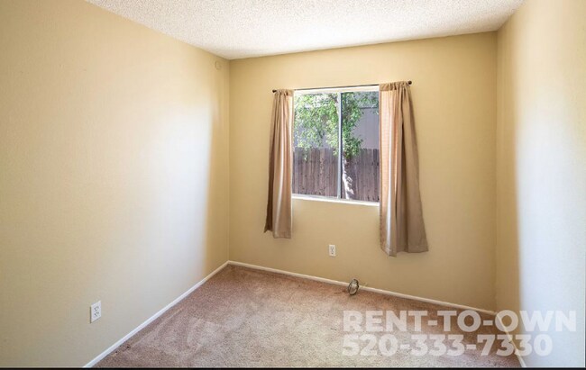 Building Photo - 8661 N Newhill Ave