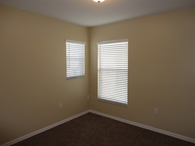 Building Photo - 11912 Mango Groves Blvd