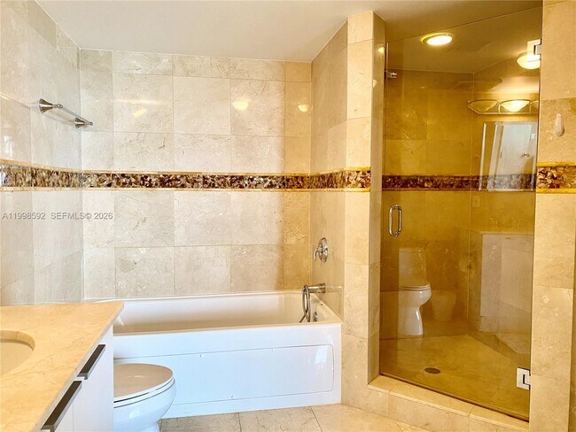 Building Photo - 16699 Collins Ave