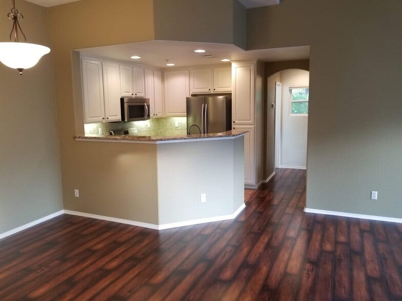 View of the Kitchen from top of the stair landing - 16939 Robins Nest Way