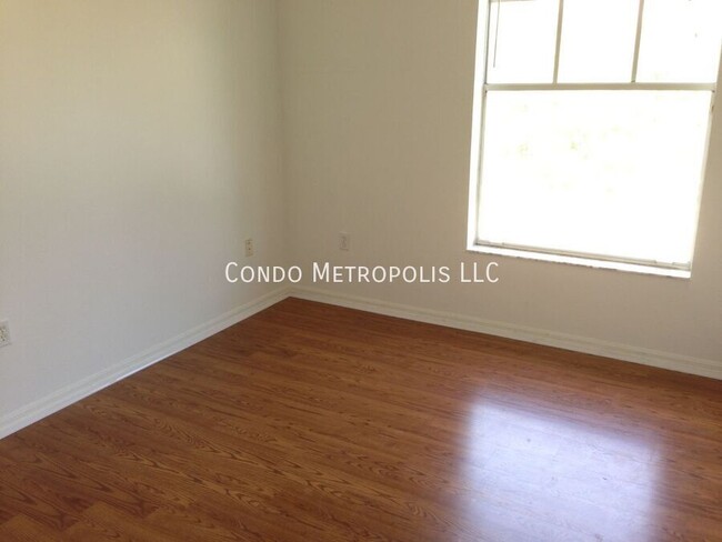 Building Photo - Hardwood floors and tile throughout!