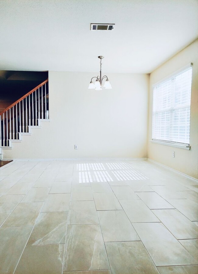 Building Photo - Coming Soon Spacious 4-Bedroom Home for Re...