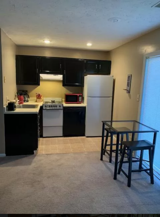 View of Kitchen. New appliances in most units. - 9608 S Bay Pointe Ct