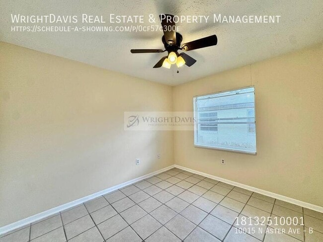 Building Photo - 10015 N Aster Ave