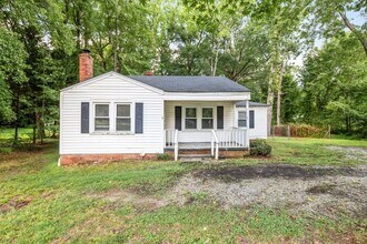 Building Photo - Adorable Home, Just Painted, Wood Flooring...