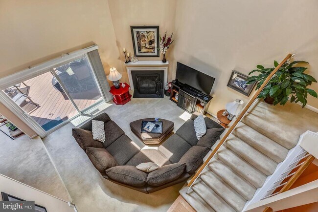 Building Photo - Experience elevated living in this beautifully renovated townhome nestled within the highly sough...