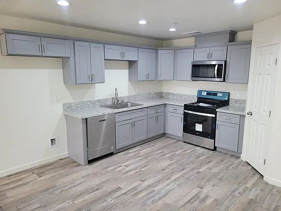 Building Photo - Freshly painted home, LVP flooring, close to schools, park, and shopping. Quiet neighborhood near...