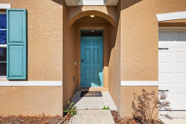 Building Photo - Available Now in Tavares | 2023 Built 4BR/2BA Home with 2-Car Garage