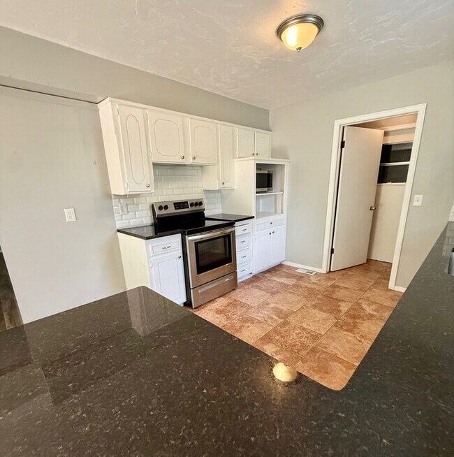 Building Photo - Charming  4-Bedroom Home in the Village!