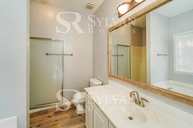 Building Photo - Lease today! No extra charge for contentment and relaxation!