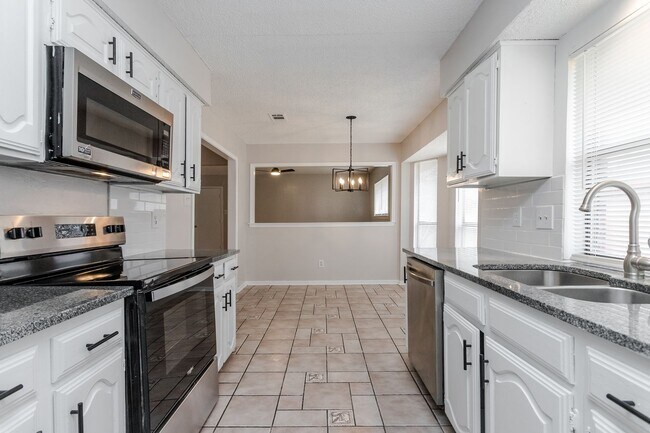 Building Photo - 4 Bedrooms | 2 Bathrooms | 2-Car Garage | Pool | Park-Front Living