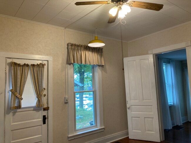 Kitchen with ceiling fan and view of marina - 317 Eagle St