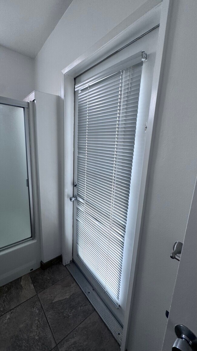 Ensuite bedroom bathroom patio door - 11983 Walnut Ln