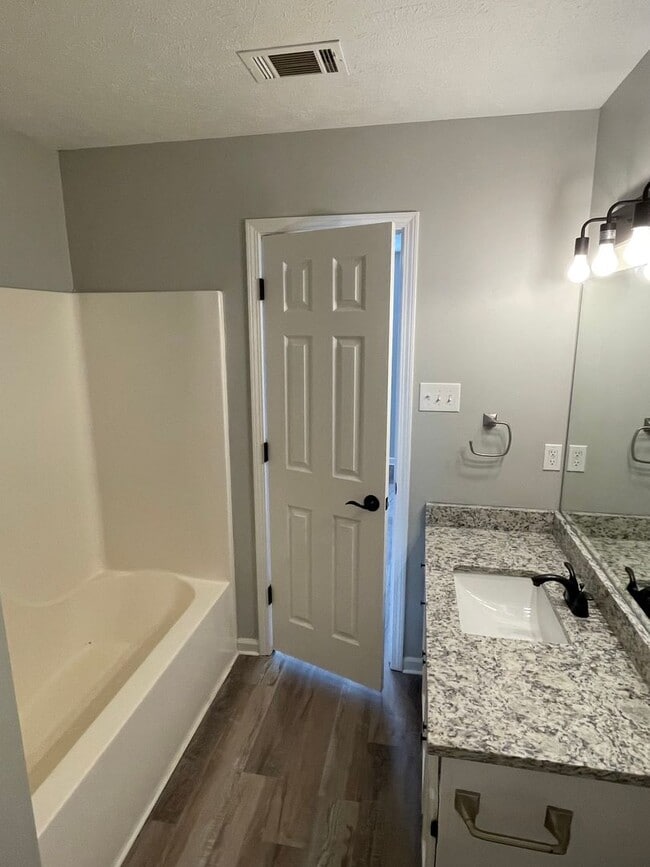 Building Photo - Updated 3/2 with privacy fence!