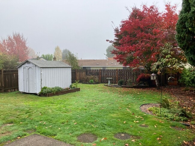 Building Photo - Charming Three Bedroom Home