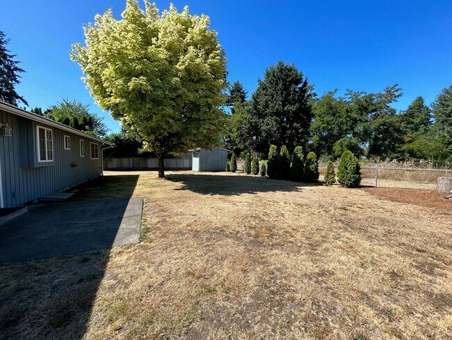 Building Photo - Rambler Fenced Backyard