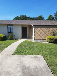 Building Photo - Cute 2BD/1BA condo. Close to shopping cent...