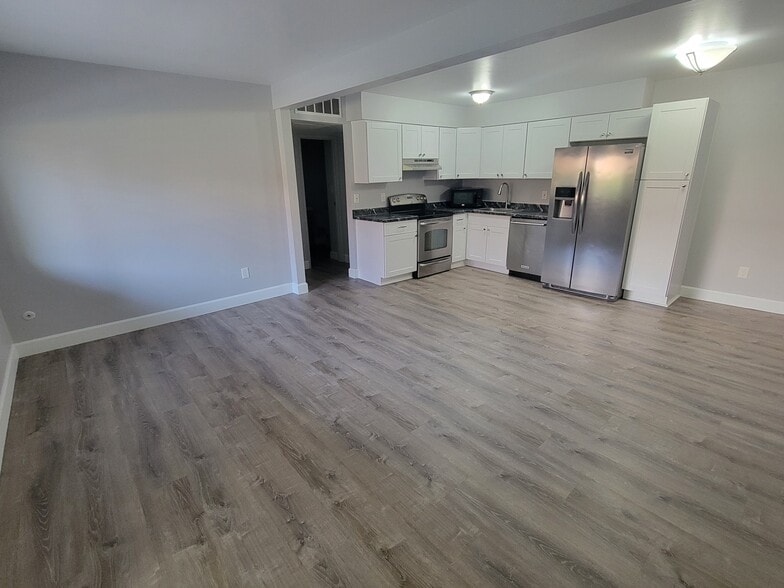 Living/Kitchen-brand new flooring and cabinets - 3663 S Sheridan Blvd