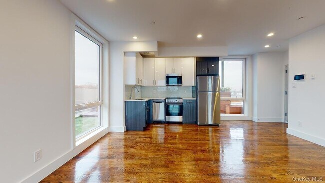 Building Photo - 138-28 Queens Blvd