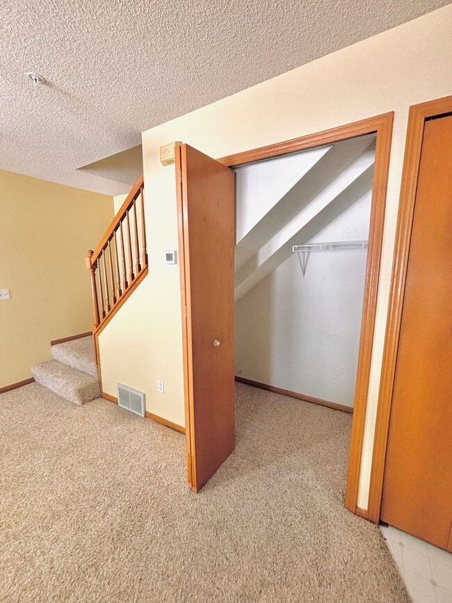Building Photo - 2 Bedroom Townhome Nestled in The Heart of...