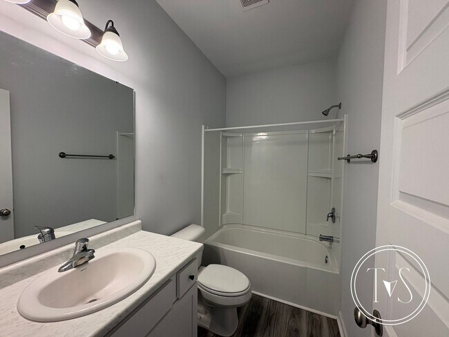 Building Photo - The perfect blend of modern living and small-town charm