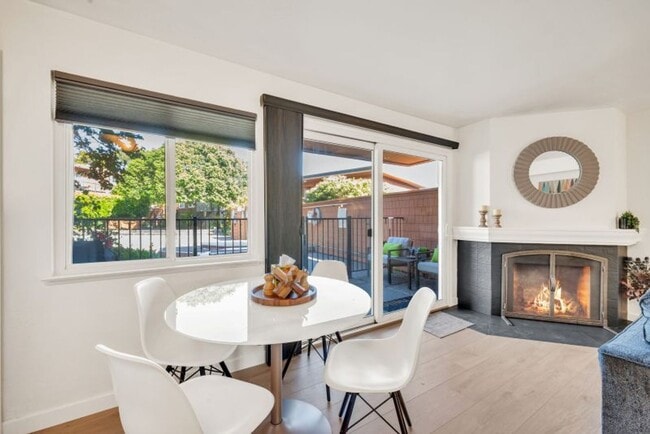 Building Photo - Darling Fully Furnished Condo Bathed in Natural Light