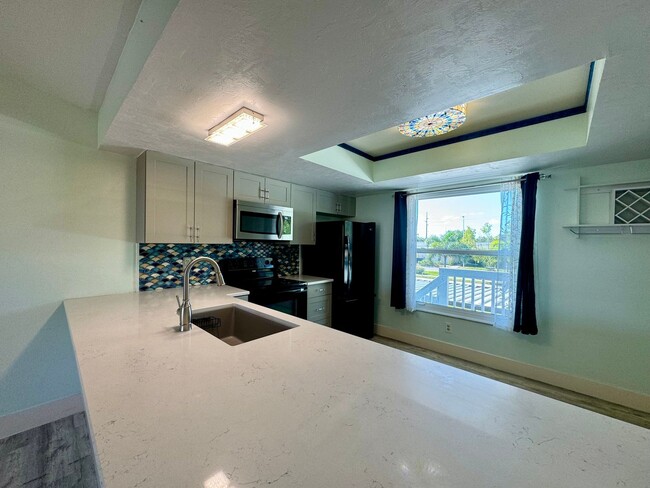 Building Photo - Stylish 2-Bedroom Condo for Rent in Prime ...