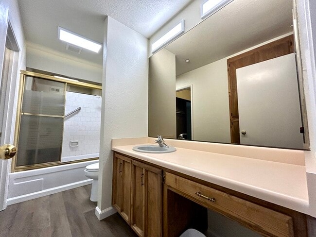 Building Photo - Beautiful Downstairs 2 Bedroom Condo Located In Gated Community Pool + Lake Access!