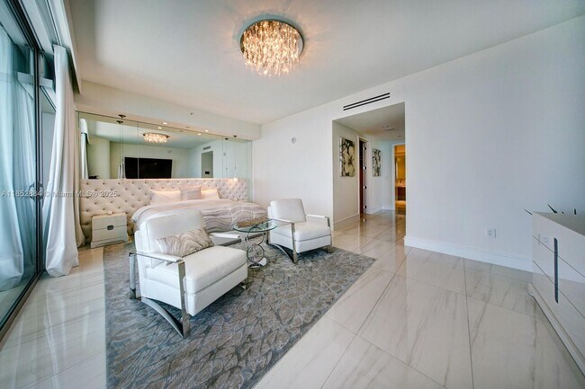 Building Photo - 10203 Collins Ave