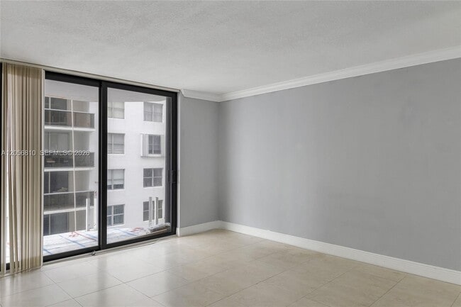 Building Photo - 6061 Collins Ave