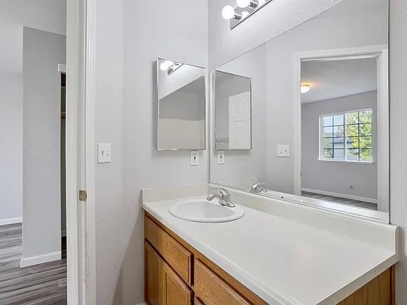 Building Photo - This is a lovely halfplex with 2 stories, 3 bedrooms, and 2.5 bathrooms in a quiet HOA neighborhood