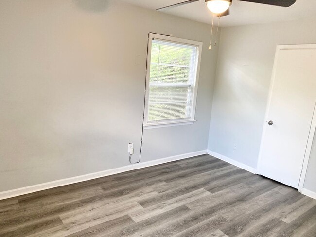 Building Photo - Charming 4BR/2BA Brick Home